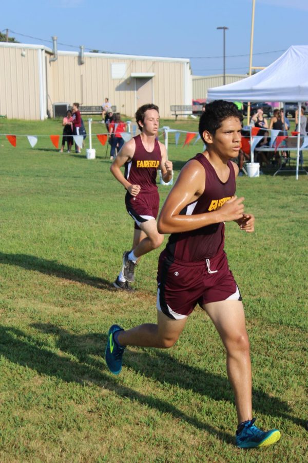 Junior Edgar Salazar runs to finish line. Photo by Braden Bossier