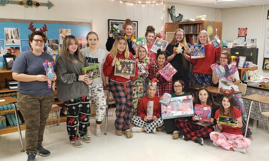 Newspaper, yearbook, and journalism classes collected 22 toys for Blue Santa. Photo contributed by Kathie Maciel.