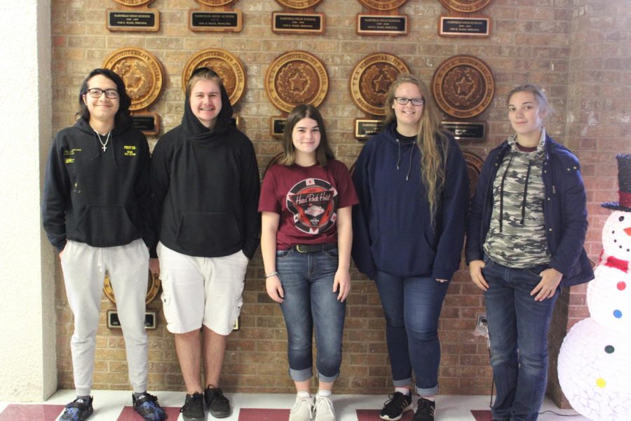 Students who placed in the All- Region Band from left to right: seniors Modesto Cortez, Tristyn Kahrs, junior Kayden Salinas, senior Abbie Cunnigham, and sophomore Emma Sharpe. Not pictured: seniors David Thomas, Drew Williams, juniors Avery Peterson, Logan Anders, and Zachary Phillips. Photo by Erin Rachel.