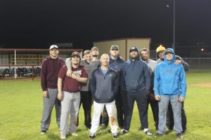 The alumni team with head coach Bill Crawford. Photo Erin Rachel.