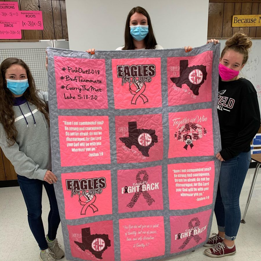 Beta Club members display the tshirt quilt presented to Mrs. Welch by the cancer society.