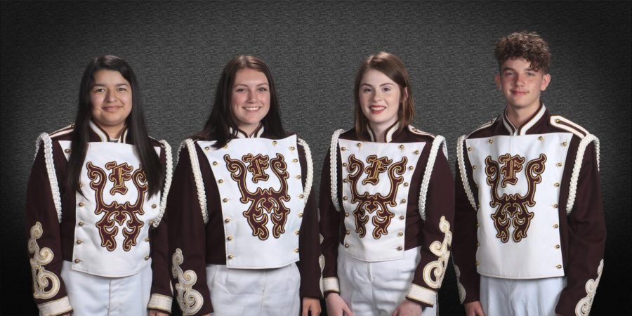 Junior Yadira Yepez, senior Frankie Nelson, senior Erica McQuinn, and junior Mason Wright lead the Grand Band from Eagle Land.