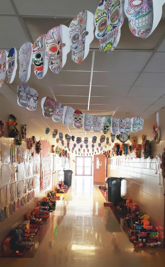 In their Spanish classes, Students created banners, alters, and wreaths for Dia de los Muertos. Photo by Audrie Smith.