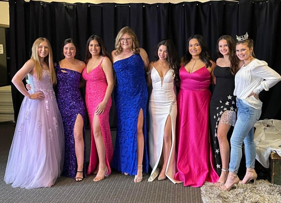 Several seniors model for the prom dress section of the Spring Style Show to benefit Freestone Cancer Support Group.