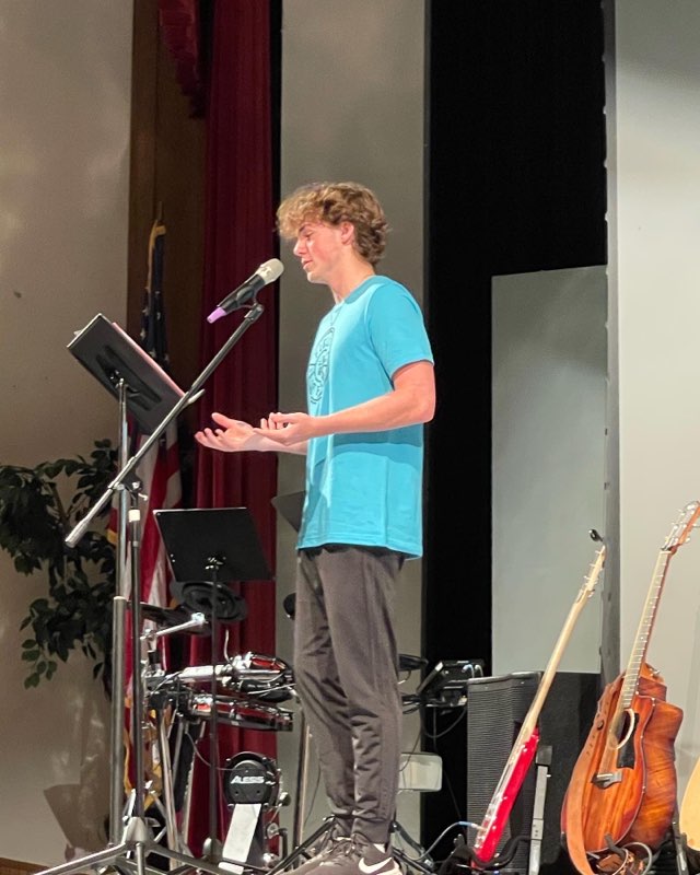 Caleb George delivers the devotional at FCAs Fields of Faith. Photo contributed by Mr. Jeff Wright.