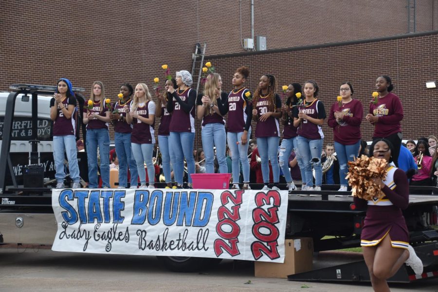 The Lady Eagles pause for a pep rally and send-off on their way to San Antonio Wednesday morning.