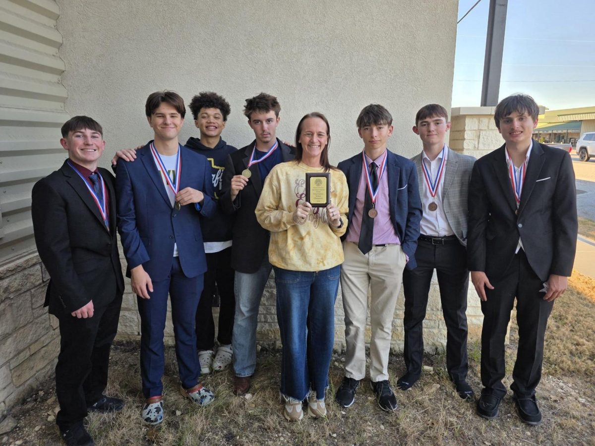 Pictured: Cane Loviette, Connor Colvert, Braylan McMillian, Laiken Carlson, Elizabeth Collier, Aaron Evans, Hudson Little, and Colten Johnson. 